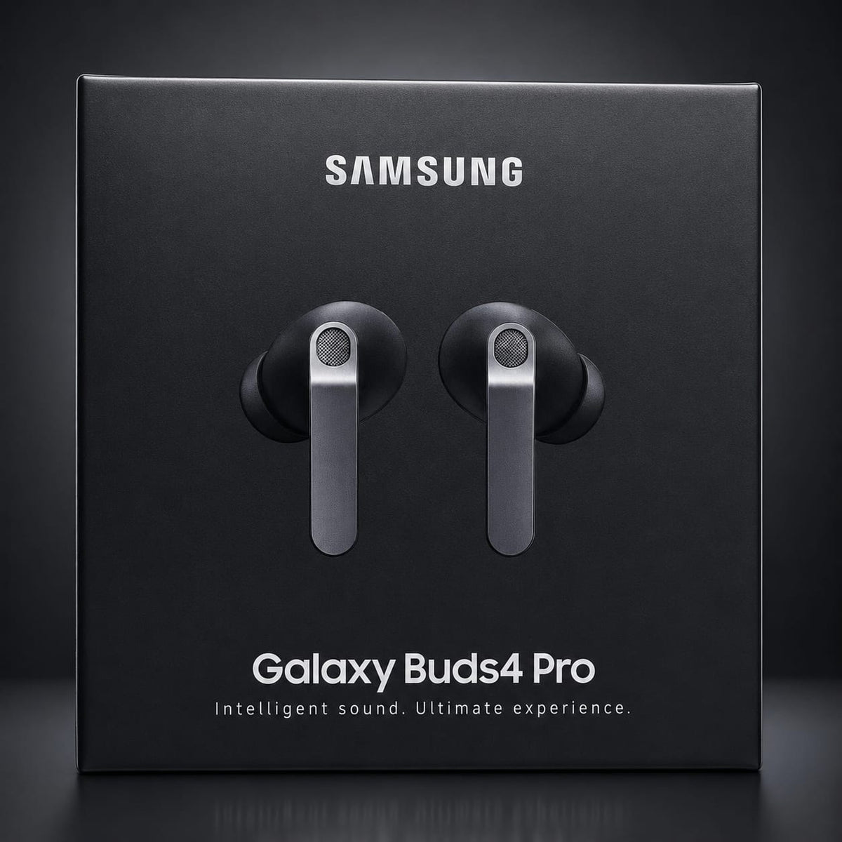 Samsung Galaxy Buds4 Pro wireless earbuds retail box shown from the front on a dark studio background. The black packaging features a centered rendering of the earbuds and white SAMSUNG and model text.